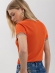 Blusa De Mangas Curtas Em Malha Com Gola Diferenciada